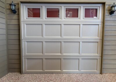 white paneled garage door with 4 windows