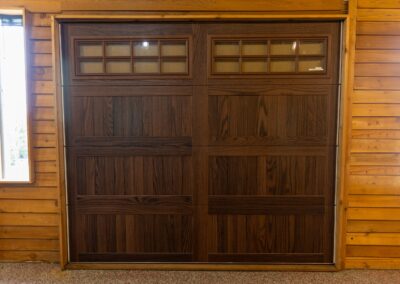 dark brown wood panel garage door